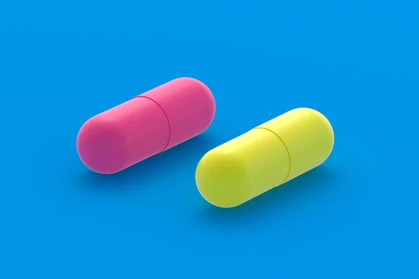 青の背景に赤と黄色の錠剤 医療と医療の概念 薬やビタミンの投与量 3Dレンダリング — ストック写真