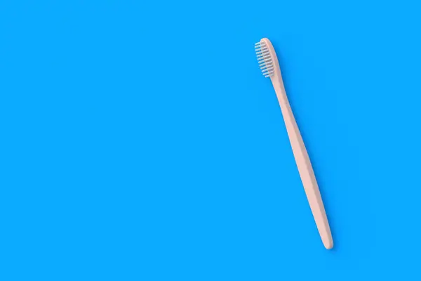 Οδοντόβουρτσα Μπλε Φόντο Αξεσουάρ Υγιεινής Και Υγείας Στο Πάνω Μέρος — Φωτογραφία Αρχείου