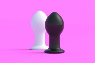 Two butt plugs on pink background. Adult anal sex toys. Sexual fantasies. Female masturbation. 3d render