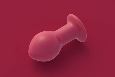 Butt plug of magenta on red background. 3d render