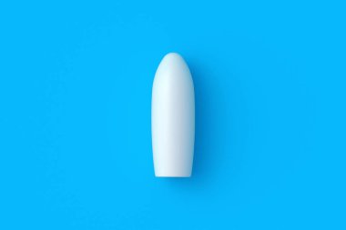 One suppository for vaginal or anal use on blue background. Candles for treatment of hemorrhoids or inflammation. Medical suppositories. Pharmaceutical products. Top view. 3d render clipart