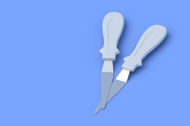 Mavi arka planda iki pasta süsleme spatulası. Şekerleme aleti. Profesyonel ekipmanlar. Uzayı kopyala 3d oluşturma