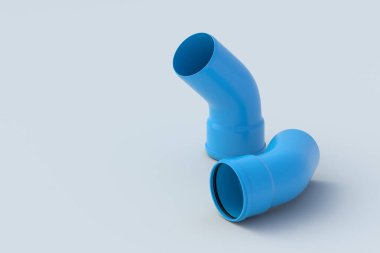 Açık gri arka planda iki adet PVC plastik köşe borusu. Tesisat malzemesi. Uzayı kopyala 3d hazırlayıcı