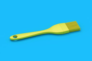 Mavi arka planda silikon fırça. Lastik mutfak gereçleri. Mutfak aletleri. Yemek aksesuarları. Fırın ekipmanları. 3d hazırlayıcı