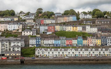 Panoramic exposure done from a ship showing the beautifull houses and Cobh Cathedral,