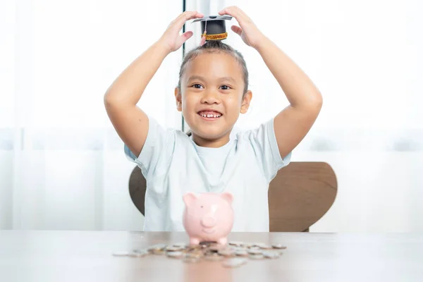 young girl saving money for education