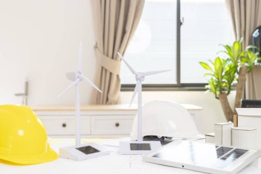 Mimarlık planlama takımı sanal gerçeklik teknolojisi hologramıyla mimari yapıya yenilenebilir ya da güneş enerjisi uygular. Gelecekteki konseptte alternatif yeşil enerji.