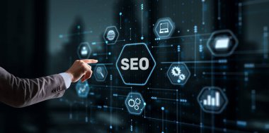 Businessmans fingers pressing a button SEO. Search engine optimization.