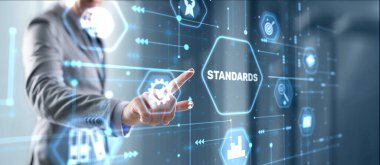 Businessman clicks Standards Quality assurance and control concept. clipart
