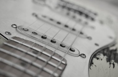 This is rock'n'roll. Impression of a worn out guitar