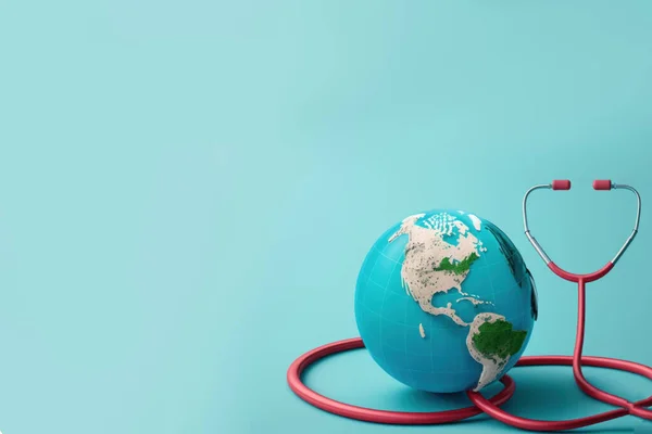 Stethoscope, globe and heart on blue background with copy space. World health day concept Global health care.