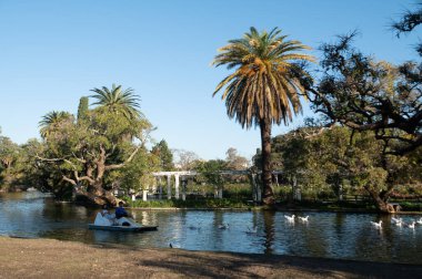 Buenos Aires, Argentina : 2023 May 15 : People enjoying the day in the pedal boats of the Bosques de Palermo lake in Buenos Aires, capital of Argentina.