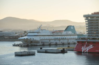 Ibiza, Spain : 2024 May 11 : Ferry from the Balearia shipping company entering the port of Ibiza in the summer of 2024. clipart