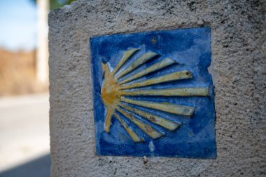 Shell of the Camino de Santiagos in the village of Hornillos del Camino, a stage from Burgos on the Camino to Santiago (St. James Way) in 2024. clipart