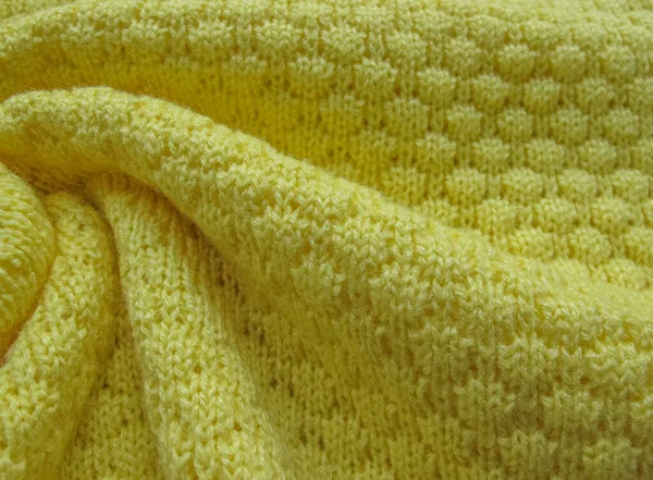 黄羊毛衫 针织毛衣质地 针织捻背景 — 图库照片