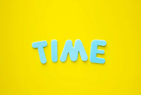 Time Text Blue Letters Yellow Background Business Concept Copy Space — Stock Photo, Image