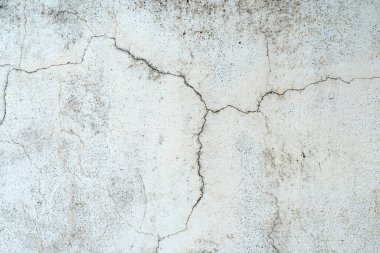 Çatlak alçı ve kirli grunge desenli yüzeyle kaplı eski beton duvar. Yüksek kalite fotoğraf