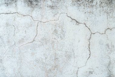 Çatlak alçı ve kirli grunge desenli yüzeyle kaplı eski beton duvar. Yüksek kalite fotoğraf