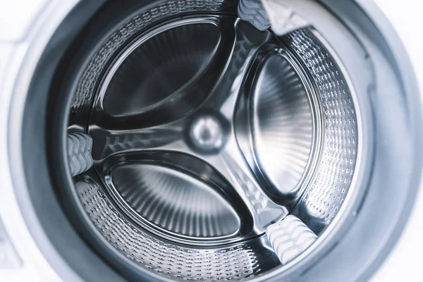 Washing machine drum. Laundry, washing powder concept. High quality photo