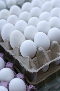 Eggs in a tray. Lots of chicken eggs at the farmers eco market. High quality photo