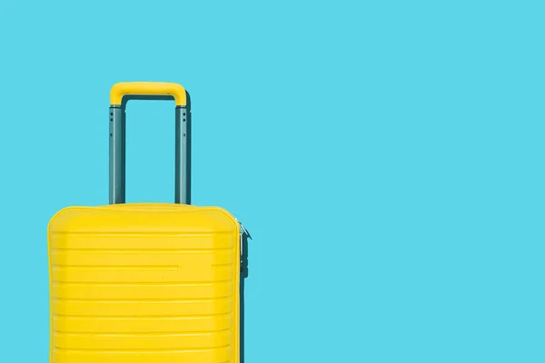 Colored suitcases on background background. Travel, vacation, trip minimal concept. High quality photo