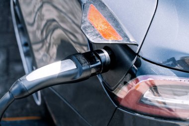 Charging station for electric cars. Types and connectors of ports for charging vehicles. High quality photo
