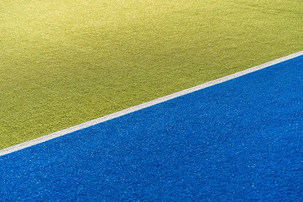 Sports court banner background. Colored artificial turf court in the stadium. High quality photo