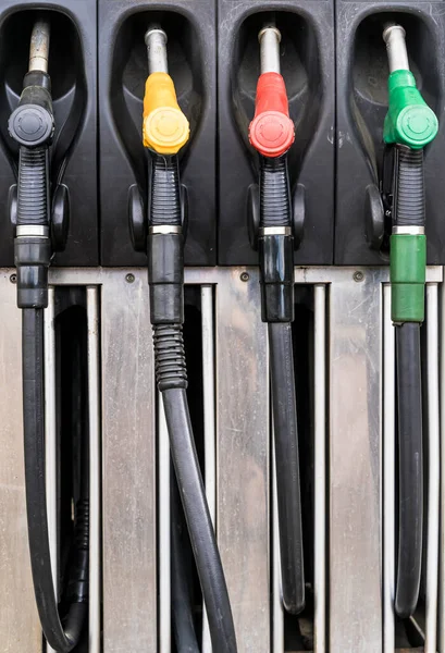 stock image gas station. Pistols with gasoline and diesel fuel at a car gas station. Oil business and transportation costs. High quality photo