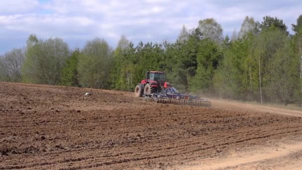 Tractor Farmers Field Plows Cultivates Soil Agriculture Farming Business Harvest — Stock Video