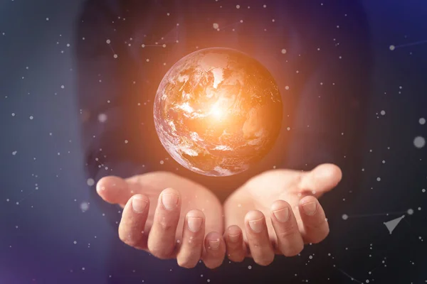 Planet Earth in hands. Global, world, business, technology concept. High quality photo