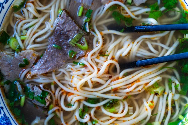 Chinese noodle soup. Asian style ramen noodles with beef and broth. Chinese Asian cuisine. High quality photo