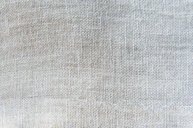 Keten kumaş dokusu arka planı. Yumuşak hafif tekstil kumaşı. Yüksek kalite fotoğraf