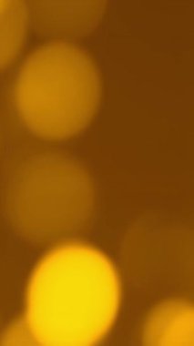 Sarı bulanık daireler dikey arkaplan. Yüksek kaliteli FullHD görüntüler