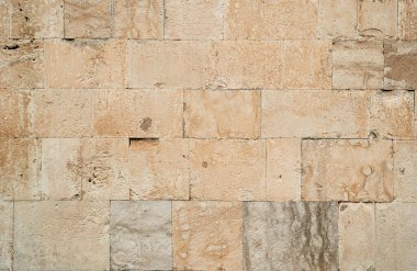 Antik taş duvar ustalığı arka planı. Bej taş bloklardan yapılmış eski duvar. Yüksek kalite fotoğraf
