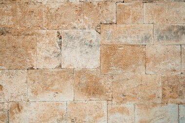Antik taş duvar ustalığı arka planı. Bej taş bloklardan yapılmış eski duvar. Yüksek kalite fotoğraf