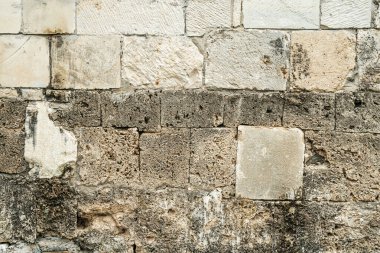 Antik taş duvar ustalığı arka planı. Bej taş bloklardan yapılmış eski duvar. Yüksek kalite fotoğraf
