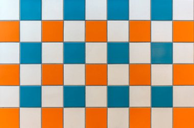 Sarı, mavi ve beyaz fayansların karışımından oluşan canlı kare seramik seramik bir zemin. Mutfak arka planlarını, banyo duvarlarını ya da iç tasarım kavramlarını resmetmek için ideal. Şey...