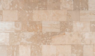 Antik taş duvar ustalığı arka planı. Bej taş bloklardan yapılmış eski duvar. Yüksek kalite fotoğraf