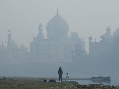 Agra, Uttar Pradesh, India - 08 Jan 2021 : The view on Taj Mahal from river side.