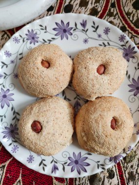 Kashmir, India - April 12 2021 : kashmir bread handmade with tea closeup shot.