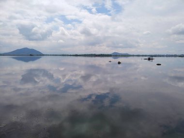 Kashmir, India - April 14th, 2021 : A view of Dal Lake in summer with blue sky.