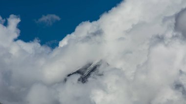Lahaul and Spiti, Himachal Pradesh, India - 07 September 2021 : Himalayan landscape with peaks covered by clouds in mountains