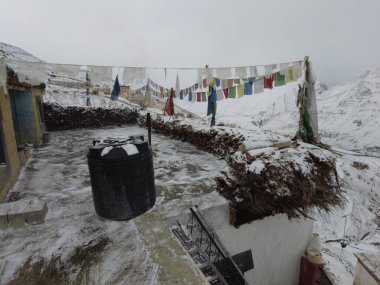 Spiti, Himachal Pradesh, India - April 7th, 2021 : Winter landscape in a fabulous location, snow covered village in himalayas.