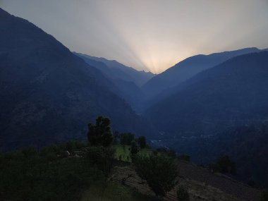 Himachal, India - June 6th, 2022 : Mountain valley during sunrise. Natural summer landscape in himalayas