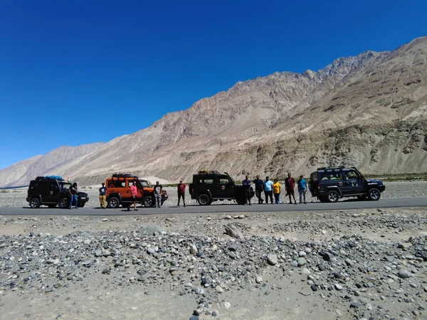 Ladakh, India - August 24th, 2022: SUV Car in Mountais, Road trip in Ladakh, Vehicle in Mountains of Himalayas.