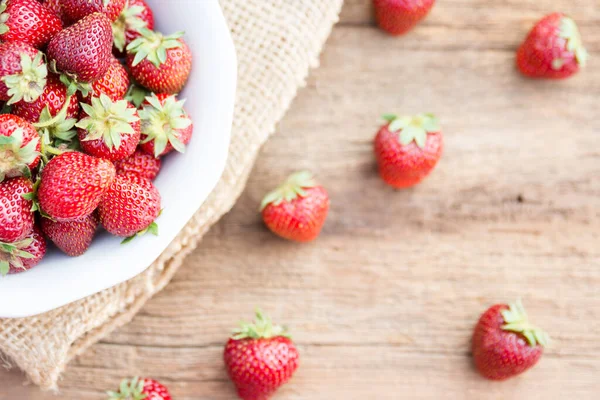 stock image a bowl of fresh strawberries outside