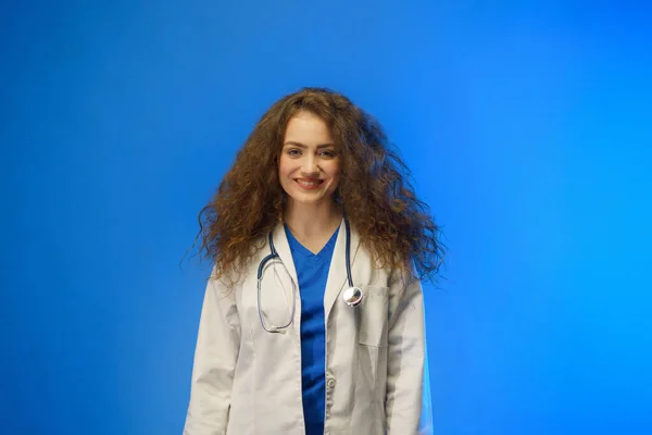 Studio Shot Young Female Doctor Looking Camera Blue Background — Stock Fotó