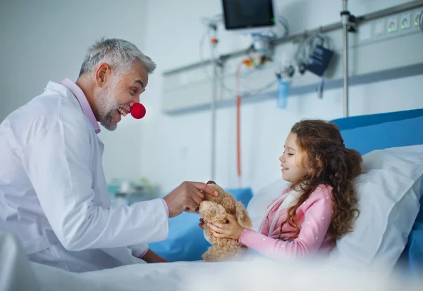 Happy Doctor Clown Red Nose Taking Care Playing Little Girl — Stock Photo, Image