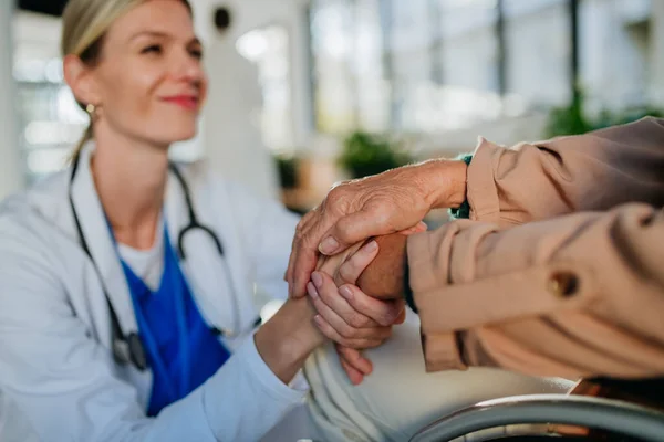 Close Young Doctor Holding Hands Patient Consoling Her — Stock Photo, Image