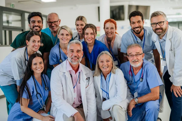 stock image Portrait of happy doctors, nurses and other medical staff in a hospital.